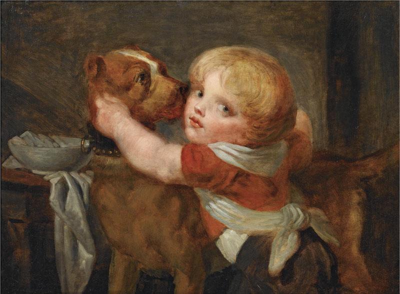 A YOUNG BOY WITH A DOG