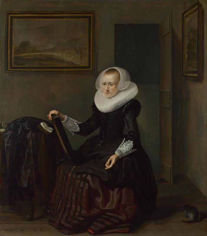 Pieter Codde - A Woman holding a Mirror