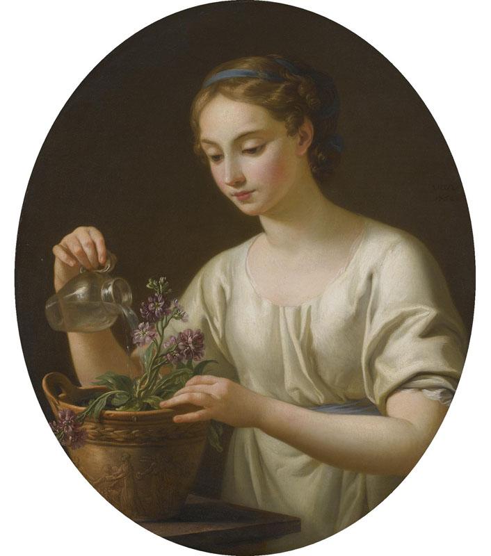 YOUNG WOMAN WATERING A POT OF FLOWERS